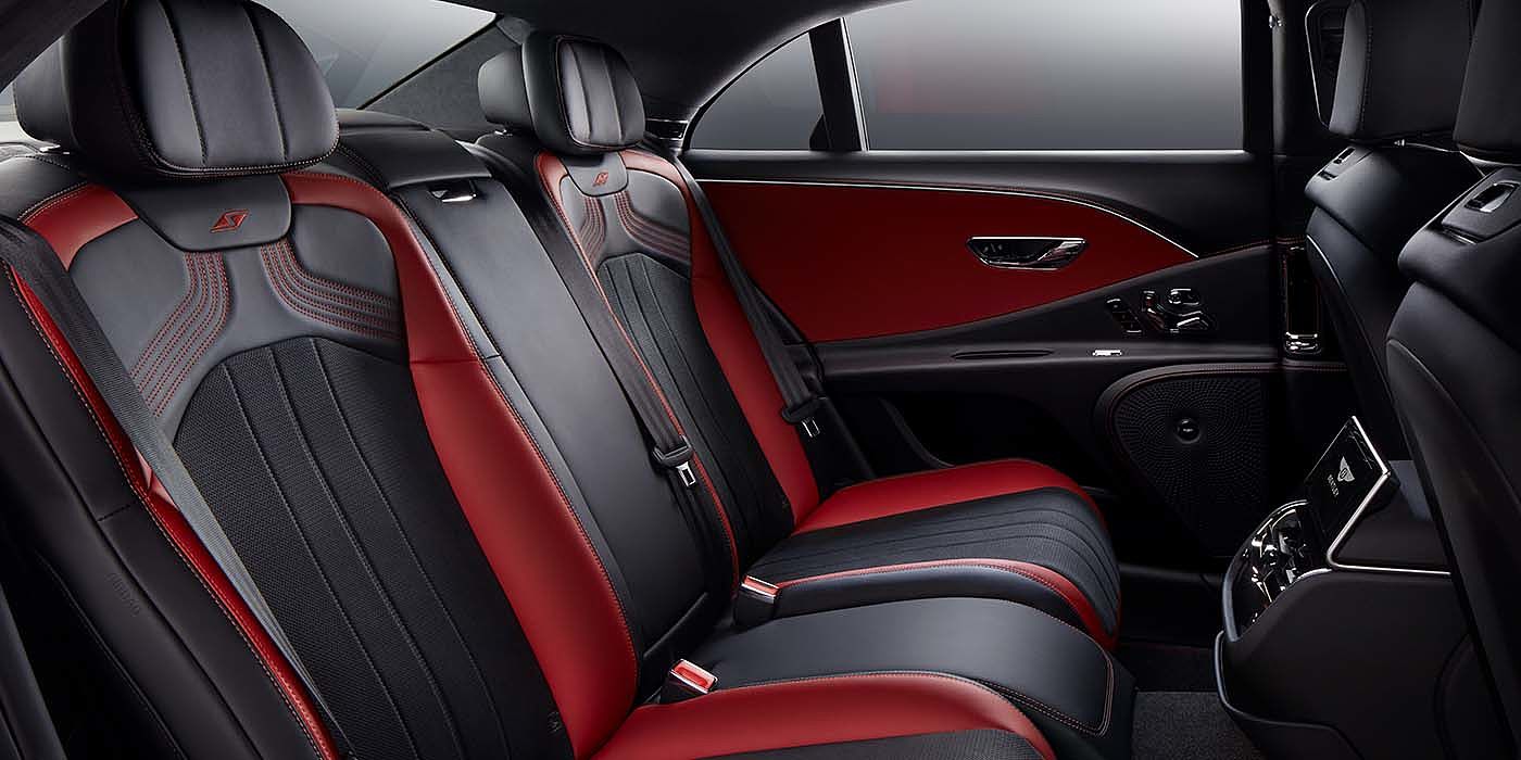 Bentley Glasgow Bentley Flying Spur S sedan rear interior in Beluga black and Hotspur red hide with S stitching
