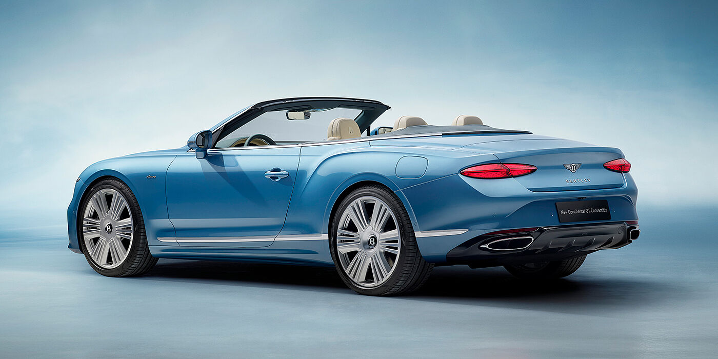 Bentley Glasgow New Bentley Continental GTC Azure convertible rear view in Light Windsor blue paint with 22 inch ten spoke wheels and chrome exterior details