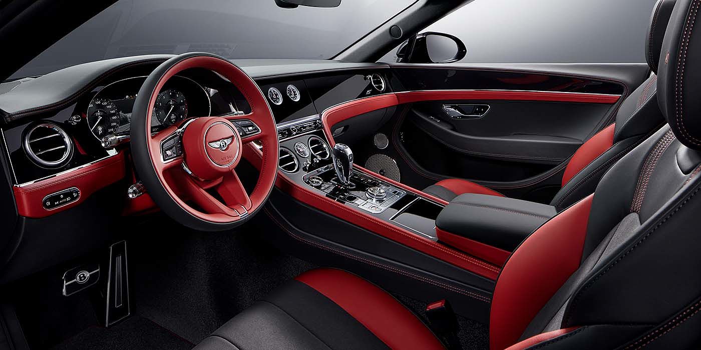 Bentley Glasgow Bentley Continental GTC S convertible front interior in Beluga black and Hotspur red hide with high gloss carbon fibre veneer