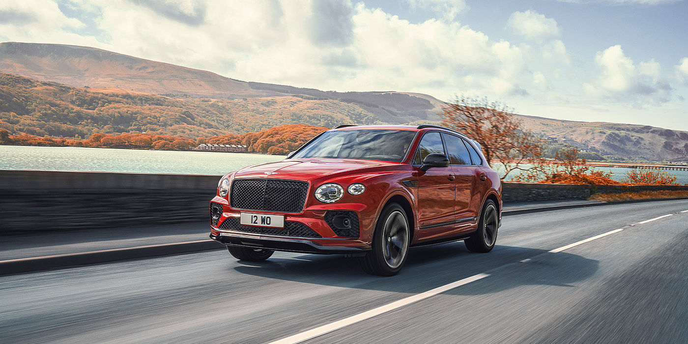 Bentley Glasgow Bentley Bentayga S SUV in Candy Red paint front 34 dynamic
