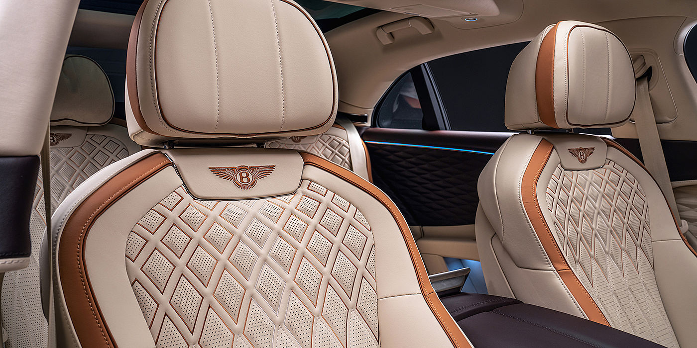 Bentley Glasgow Bentley Flying Spur Odyssean sedan rear seat detail with Diamond quilting and Linen and Burnt Oak hides