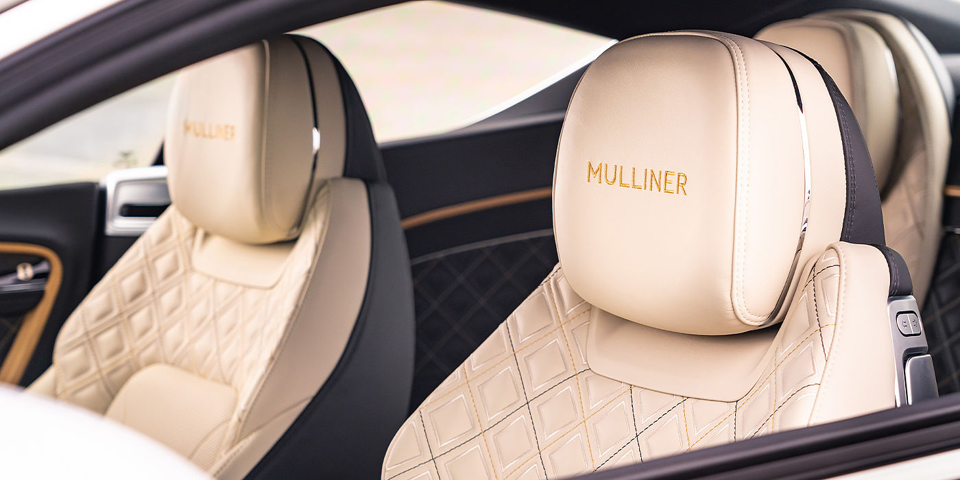 Bentley Glasgow Bentley Continental GT Mulliner coupe seat detail in Beluga black and Linen hide