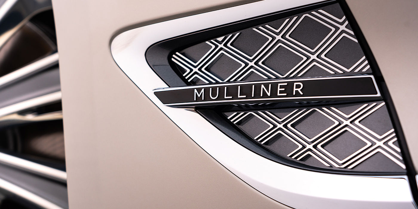 Bentley Glasgow Bentley Continental GT Mulliner coupe in White Sand paint Mulliner wing vent close up