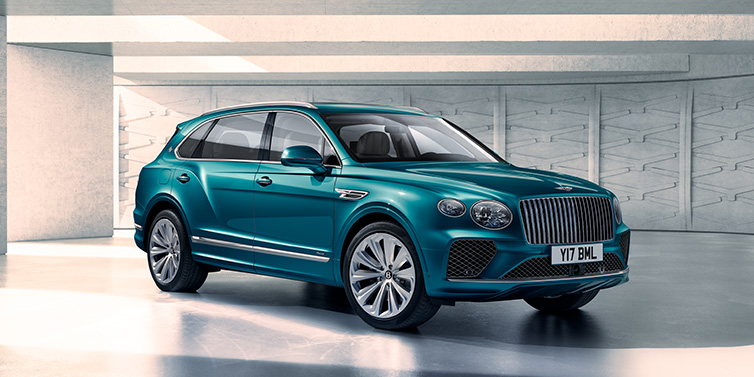 Bentley Glasgow Bentley Bentayga Extended Wheelbase Azure SUV front three quarter in Topaz blue paint colour with a grey background