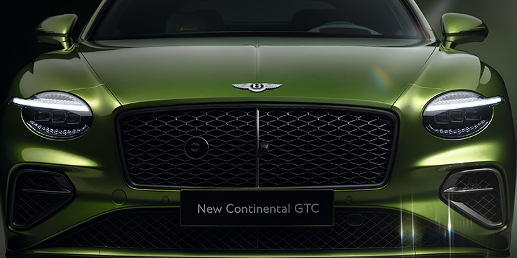 Bentley Glasgow Bentley Continental GTC Speed convertible front bonnet detail in Tourmaline Green paint showing new light design