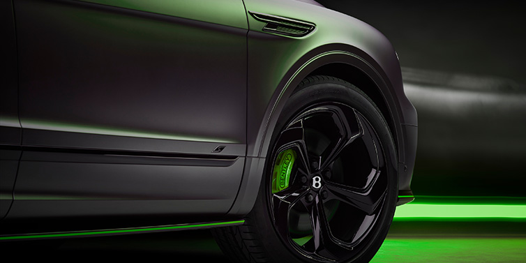 Bentley Glasgow Bentley Bentayga S Black Edition SUV exterior wheel detail with Cyber Green brakes with Anthracite Satin paint