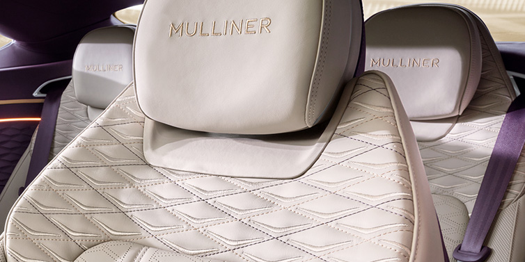 Bentley Glasgow Bentley Continental GT Mulliner coupe seat detail in Linen leather with Mulliner Diamond in Diamond quilting and Mulliner embroidered seat emblem